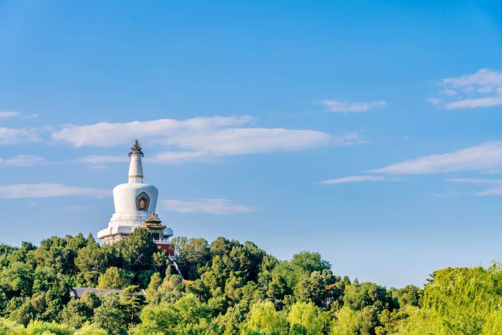 White Pagoda at Beihai Park under blue sky in Beijing, China