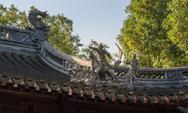 Detail of George and Dragon on roof in Yu or Yuyuan Garden in the old city of Shanghai