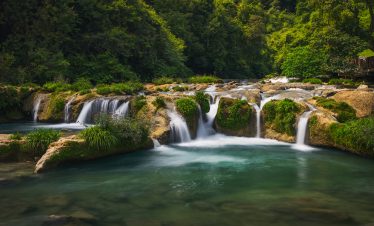 Small waterfall at Xiaoqikong, Libo, Guizhou, China.