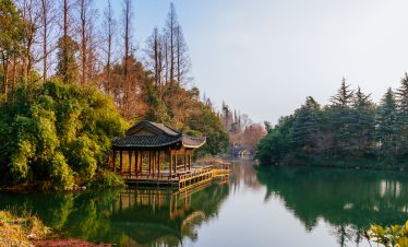 Traditional pavilion on the water at West Lake, Hangzhou, China.