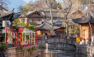 Charming water town scene in Yunnan Lijiang Old Town with bridges and flowing canals