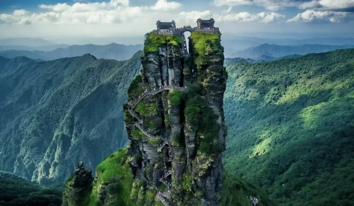 Fanjingshan Mountain towering into the clouds on a sunny day in Guizhou, China