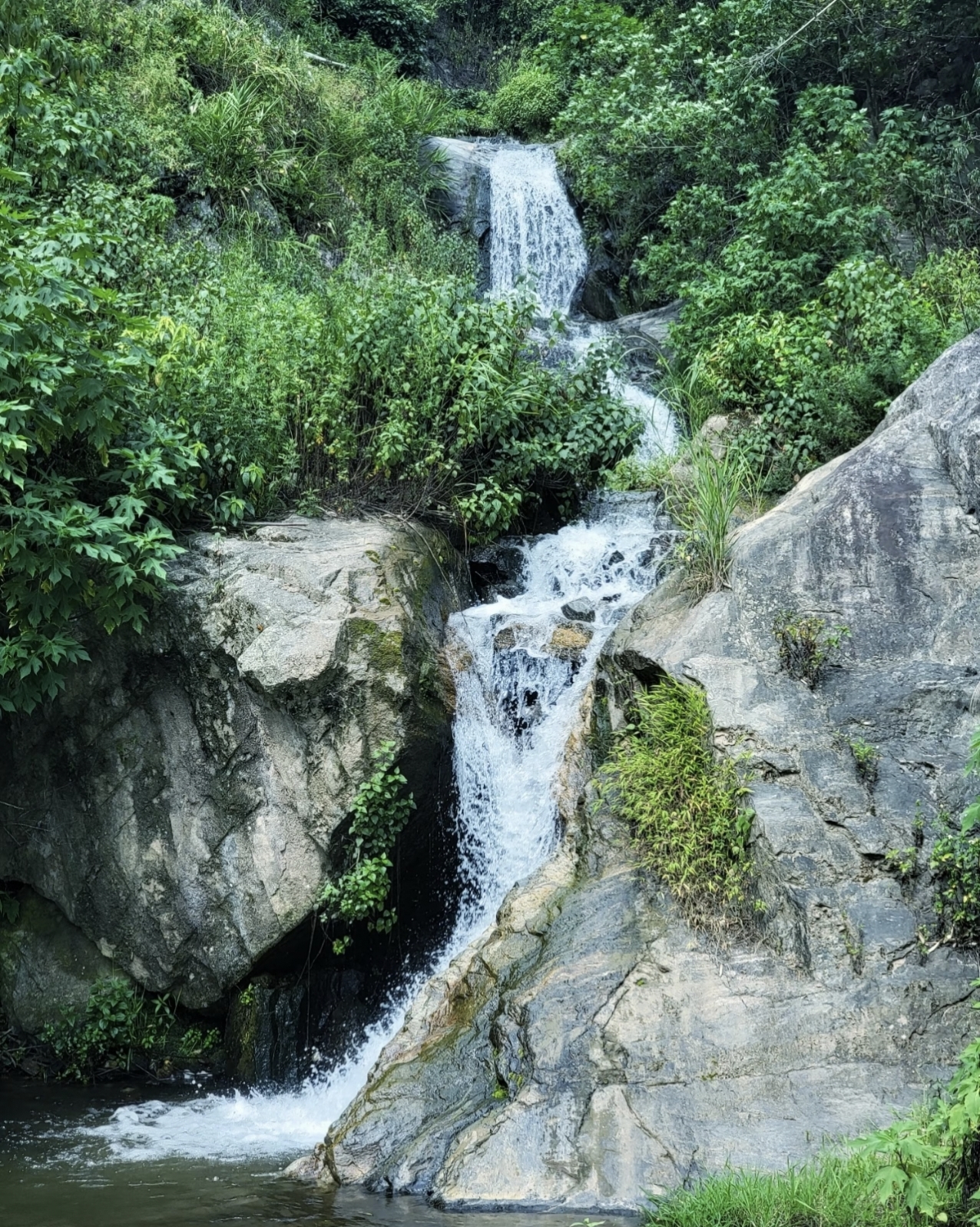 Nanen Waterfall cascading down in Ailao Mountain Yunnan