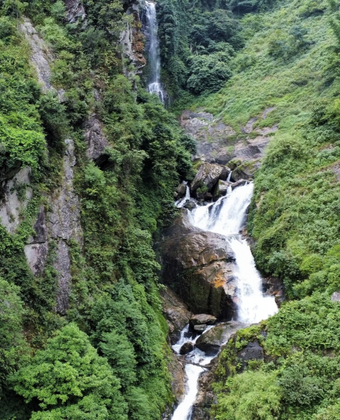 Nanen Waterfall cascading down in Ailao Mountain Yunnan