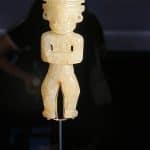 A small jade figurine in the Shanghai Museum, China, reflecting ancient sculptural techniques.