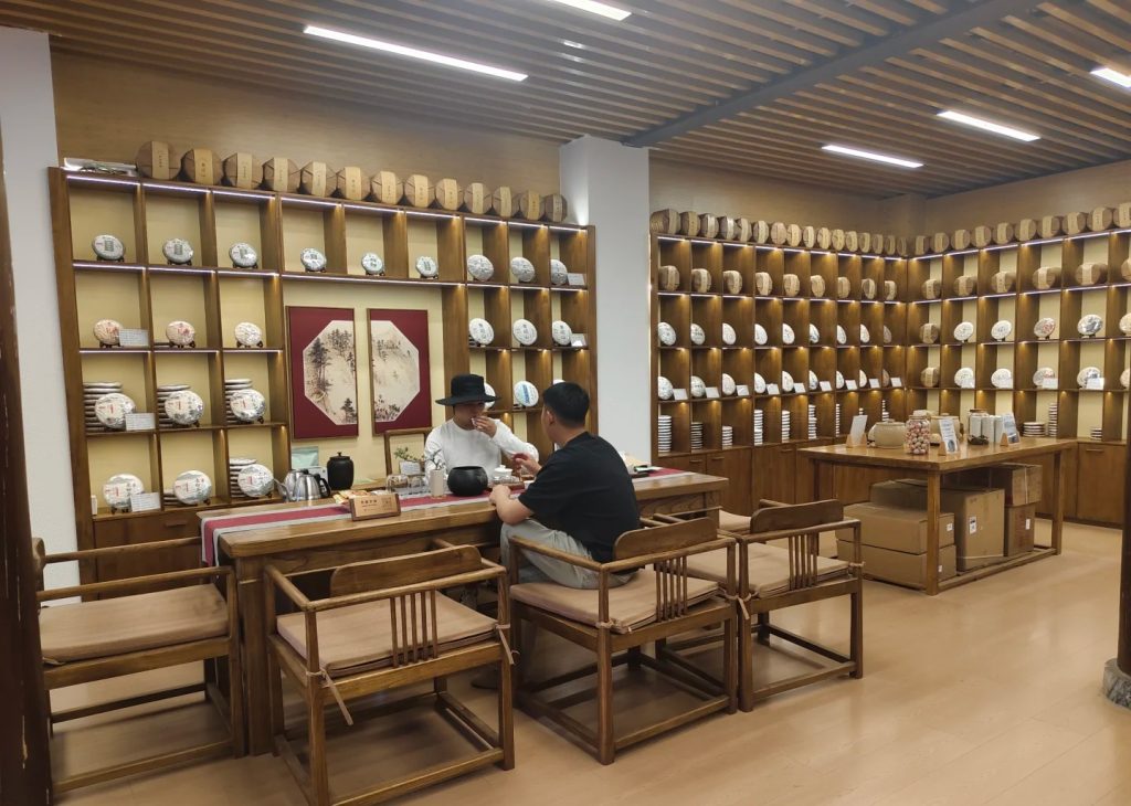 Local tea shop in Dali Old Town displaying different types of Pu-erh tea.