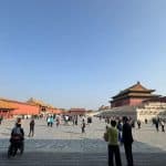 Crowds of tourists at the Forbidden City, Beijing, China, exploring the imperial palace.