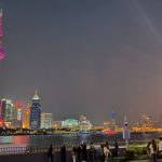 The beautiful scenery of the Bund in Shanghai, China, with views of modern and historic buildings.