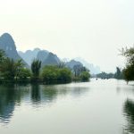 Stunning reflection of Li River's karst peaks on the water in Guangxi, China.