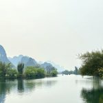 Stunning reflection of Li River's karst peaks on the water in Guangxi, China.
