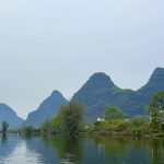Stunning reflection of Li River's karst peaks on the water in Guangxi, China.
