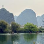 Stunning reflection of Li River's karst peaks on the water in Guangxi, China.