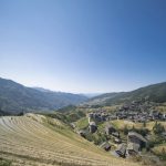The terraced rice fields in Guangxi, China, showcasing layers of vibrant green.