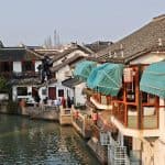 Locals walking through the corridors by the canals in ZhuJiaJiao Water Town, Shanghai,China.