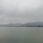 The serene landscape of West Lake in Hangzhou, China, known for its natural beauty.