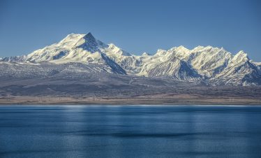 Pekhu Tso Lake with distant Shishapangma Mountain in Tibet
