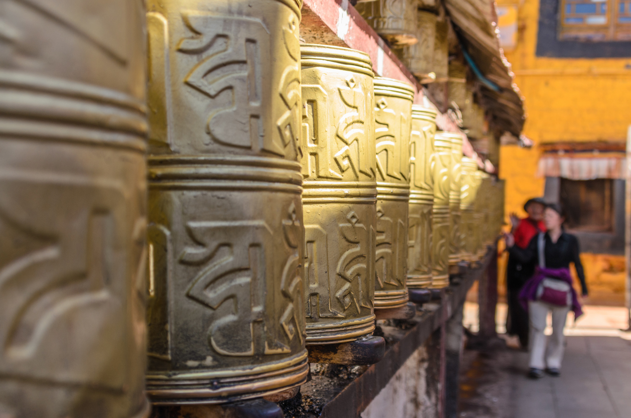 Close-up of prayer wheel near Potala Palace in Tibet