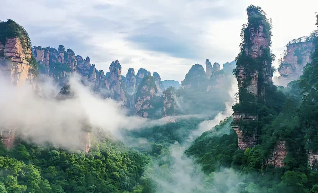 Mist and clouds surrounding the mountain peaks at Zhangjiajie National Forest Park in Hunan, China