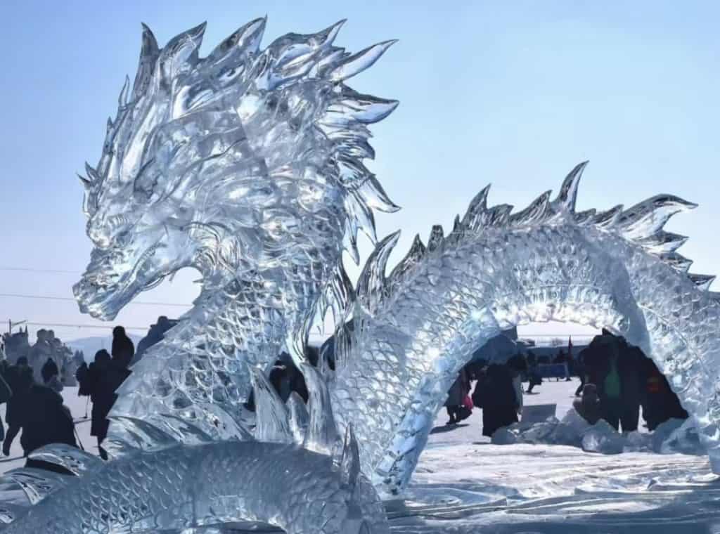 Lifelike dragon ice sculpture at Harbin Ice and Snow Festival, China