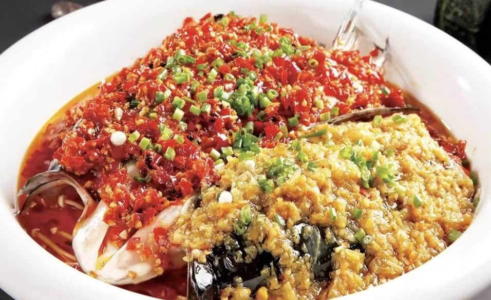 Spicy and flavorful chopped chili fish head, a famous local dish from Hunan, China